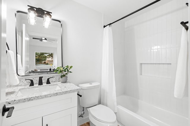 full bathroom featuring shower / bath combination with curtain, vanity, and toilet