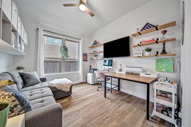 office featuring light wood-type flooring, vaulted ceiling, and ceiling fan