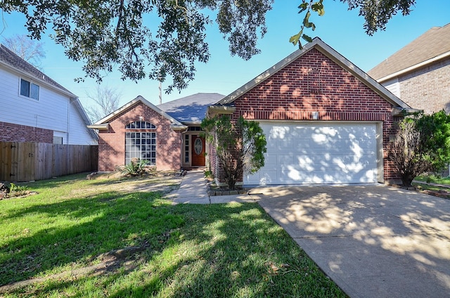 single story home featuring driveway, an attached garage, fence, a front lawn, and brick siding