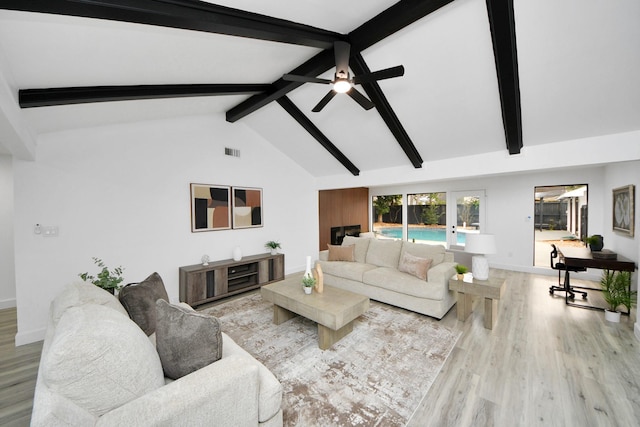 living room featuring french doors, beam ceiling, light hardwood / wood-style floors, ceiling fan, and high vaulted ceiling