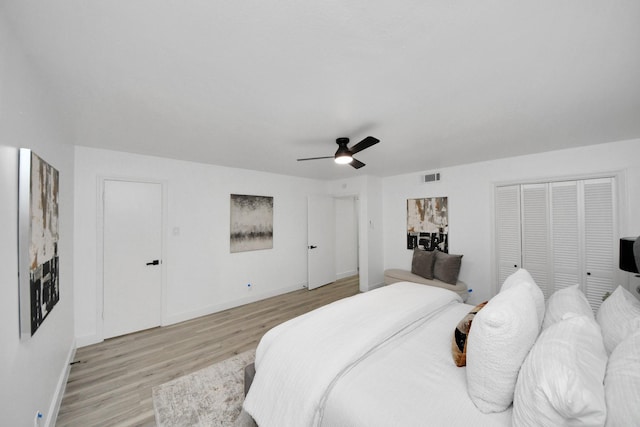 bedroom featuring ceiling fan and light hardwood / wood-style flooring