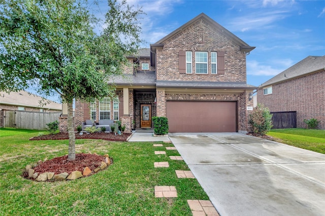 view of front of house with a garage and a front yard