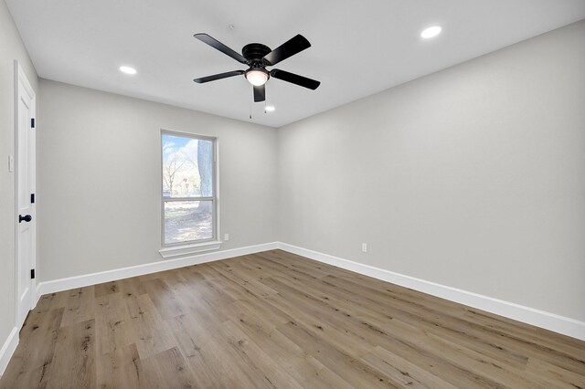 2926 Cypress Point Dr, Missouri City, TX 77459 - empty room featuring recessed lighting, baseboards, ceiling fan, and wood finished floors
