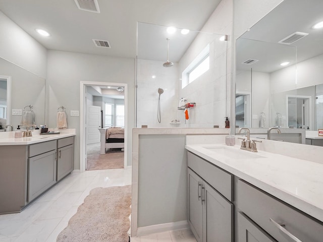 bathroom with vanity and walk in shower