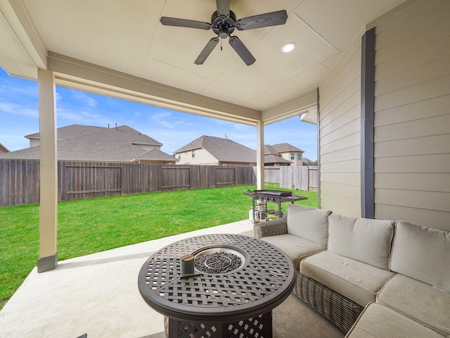 view of patio featuring an outdoor living space and ceiling fan