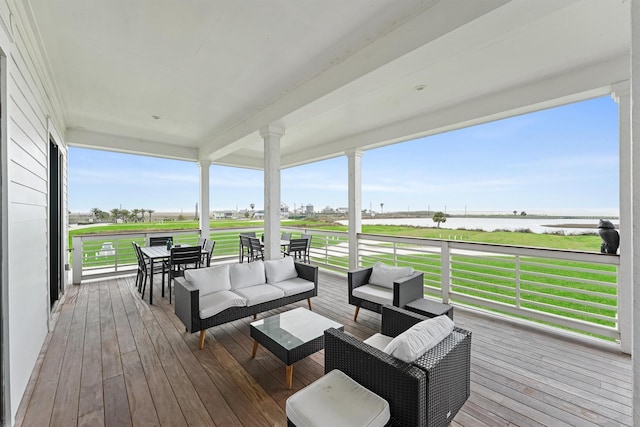 wooden deck featuring an outdoor hangout area