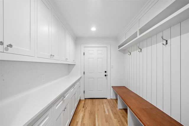 mudroom with light wood-style flooring