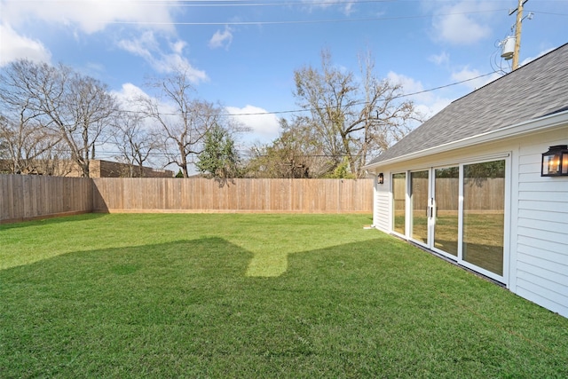 view of yard featuring a fenced backyard