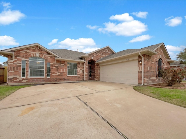 ranch-style house featuring a garage