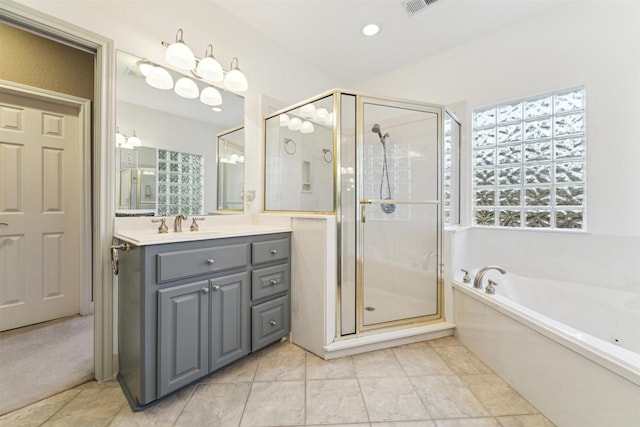 bathroom featuring plus walk in shower and vanity