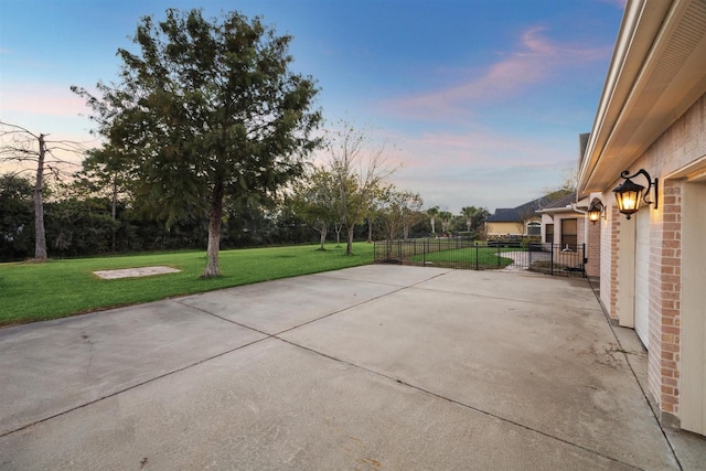 patio terrace at dusk with a yard