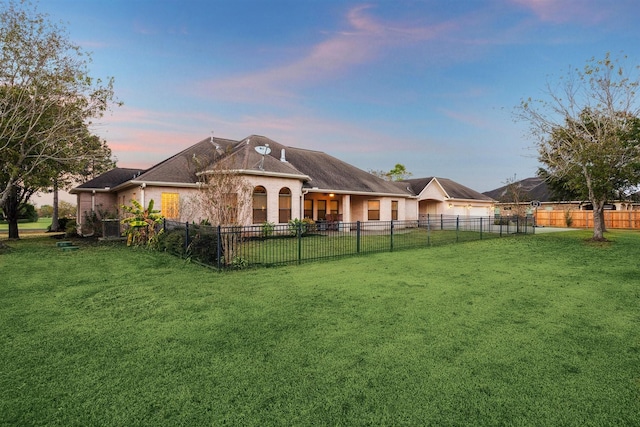 view of front of house featuring a yard