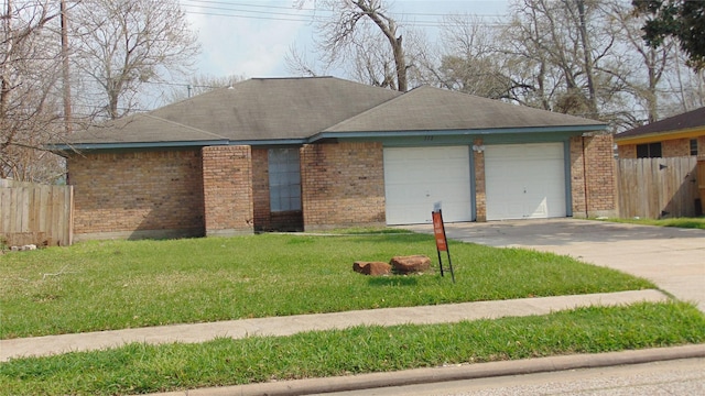 ranch-style home with a front yard, brick siding, fence, and an attached garage