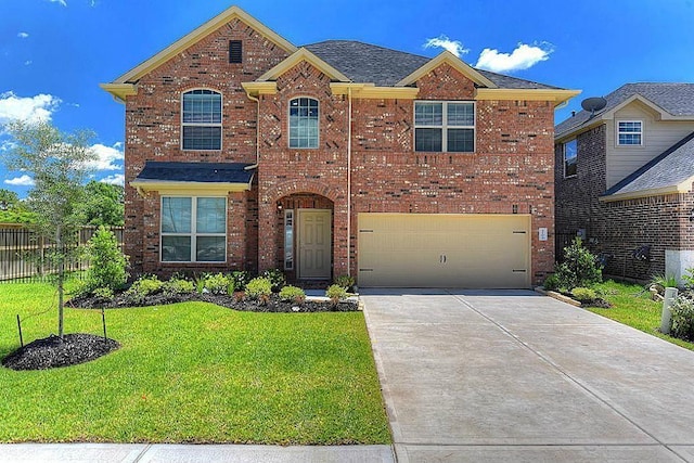 front facade featuring a garage and a front lawn