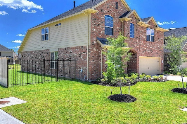 view of side of home with a garage and a lawn