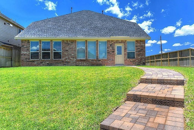 exterior space with a front lawn