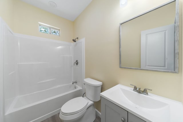 full bath with shower / bathing tub combination, vanity, and toilet