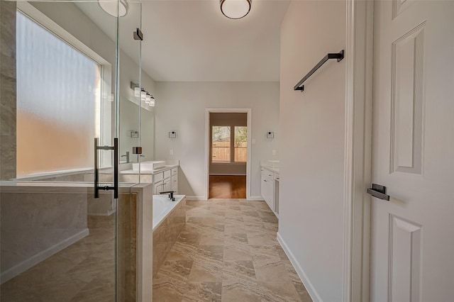 bathroom with plus walk in shower and vanity