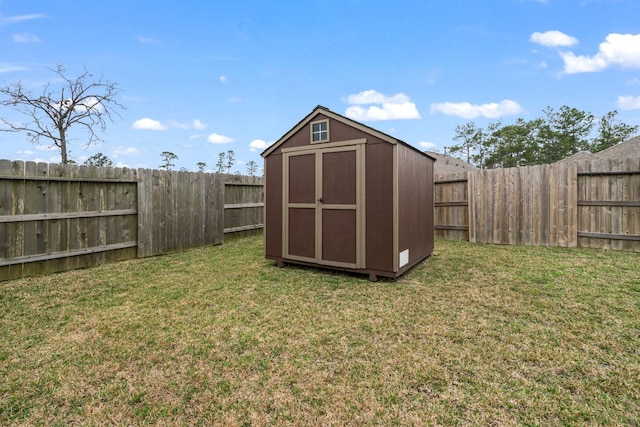 view of shed featuring a fenced backyard