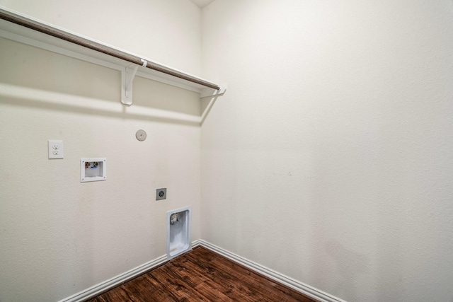 laundry area with laundry area, baseboards, dark wood finished floors, hookup for an electric dryer, and washer hookup