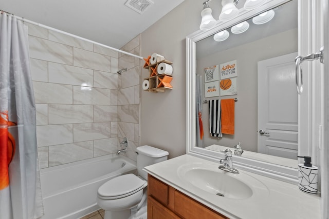 full bathroom featuring shower / bath combo with shower curtain, vanity, and toilet