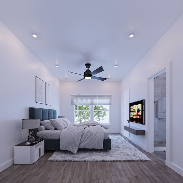 bedroom with recessed lighting, ensuite bathroom, a ceiling fan, wood finished floors, and baseboards