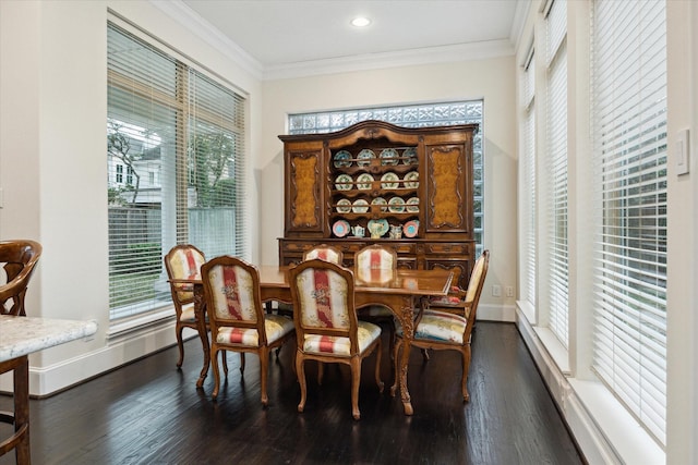 dining space featuring baseboards, ornamental molding, dark wood-style flooring, and recessed lighting