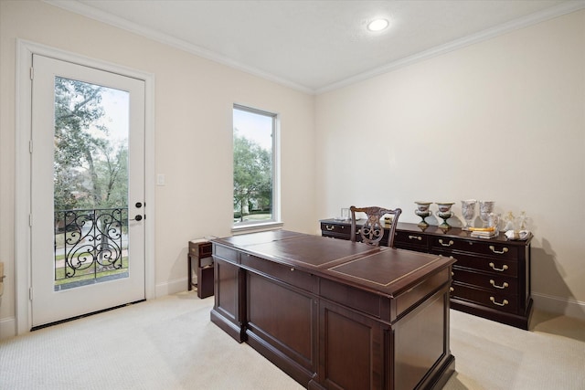 office area with crown molding, baseboards, and light colored carpet