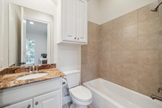 bathroom with  shower combination, vanity, and toilet