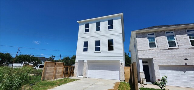 view of front of property with a garage