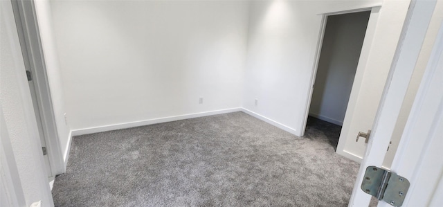 unfurnished bedroom with carpet floors