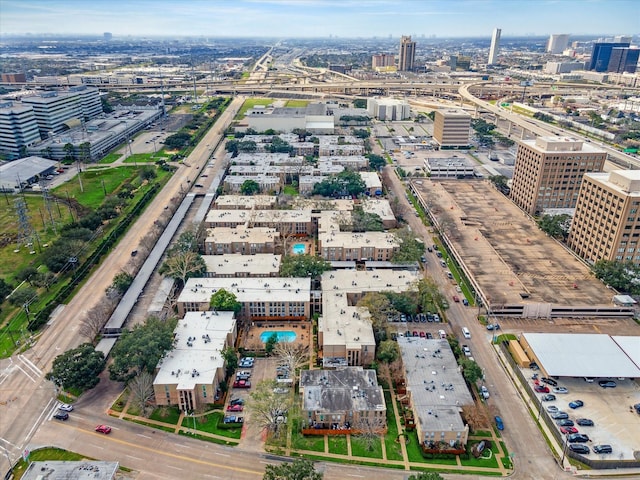 drone / aerial view featuring a city view