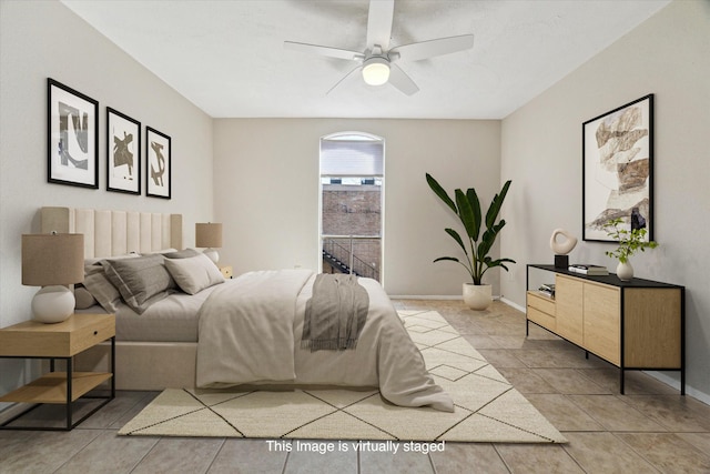 bedroom with light tile patterned floors, ceiling fan, and baseboards