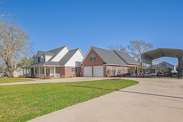 view of front of house with brick siding, fence, a carport, driveway, and a front lawn