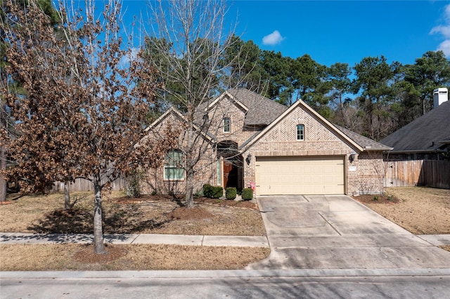 front of property with a garage