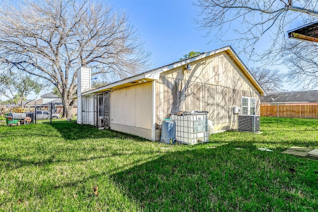 view of property exterior with a yard