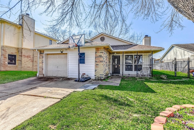 view of front of house with a front lawn and a garage