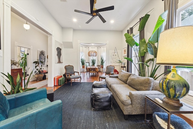 living room with ceiling fan, hardwood / wood-style floors, and plenty of natural light