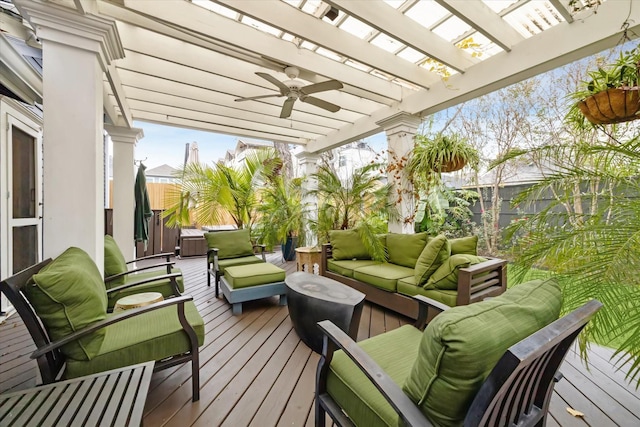 deck with ceiling fan, a pergola, and outdoor lounge area