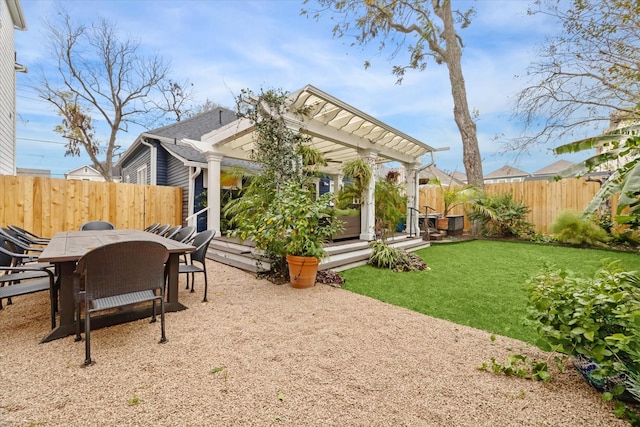 exterior space with a patio area, a lawn, and a pergola