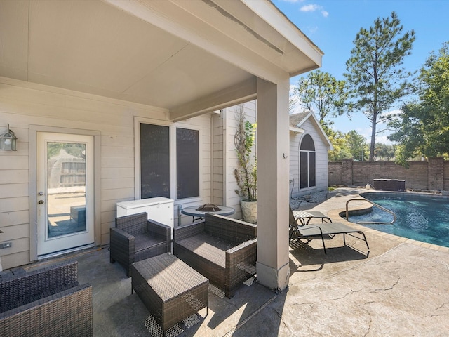 view of patio with an outdoor hangout area and a fenced in pool