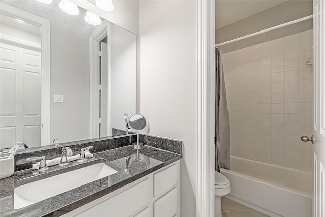 bathroom with toilet, shower / tub combo with curtain, vanity, and tile patterned floors