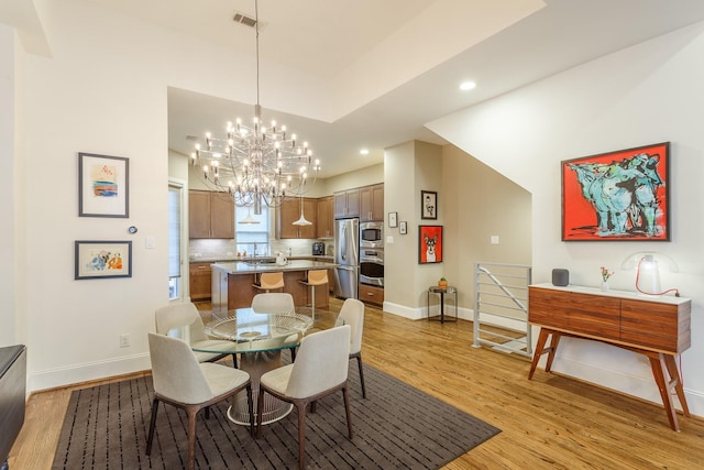 dining room featuring light hardwood / wood-style floors