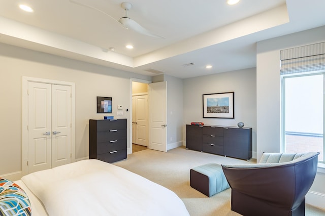 carpeted bedroom with a closet