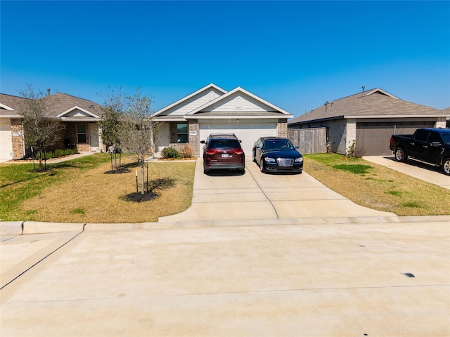 ranch-style house with concrete driveway, a front lawn, an attached garage, and brick siding