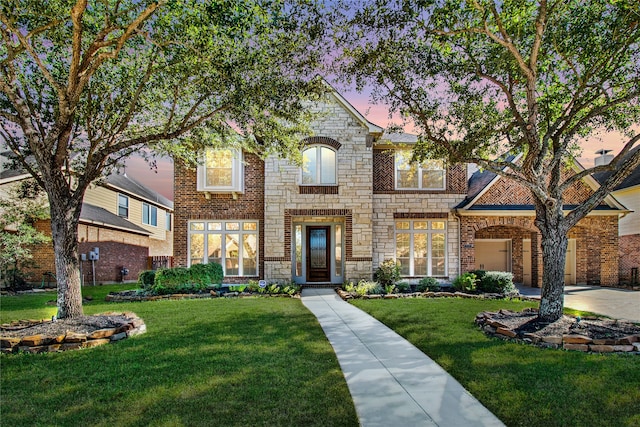 view of front of house with a yard