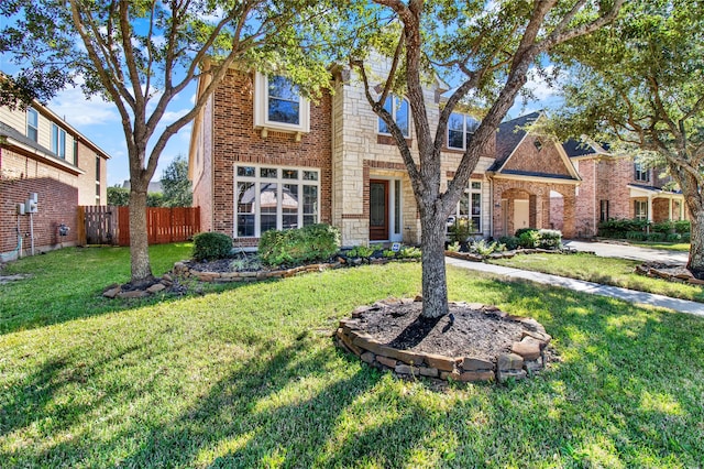 view of front of house featuring a front lawn