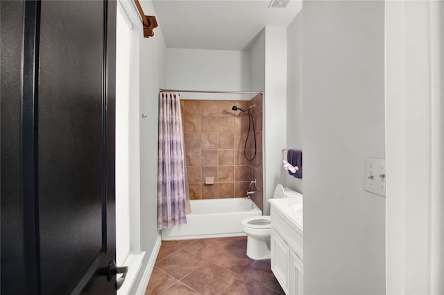 full bathroom with shower / tub combo with curtain, vanity, toilet, and tile patterned floors