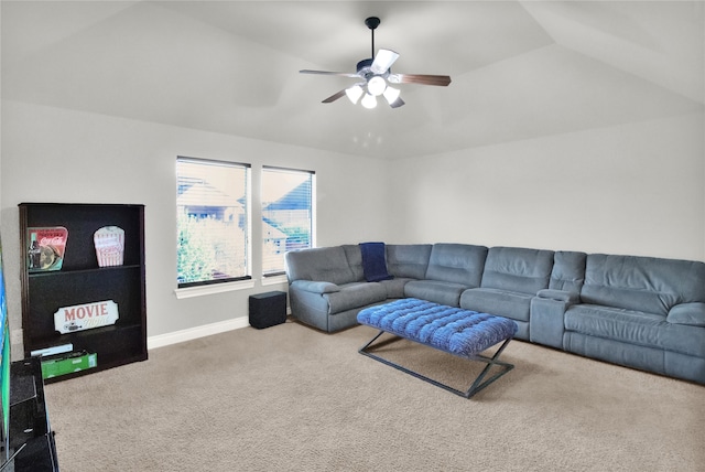 carpeted living room with vaulted ceiling and ceiling fan