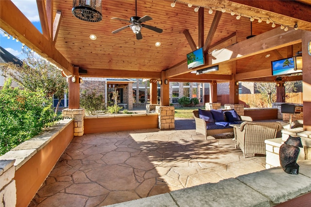 view of patio / terrace featuring an outdoor living space and ceiling fan